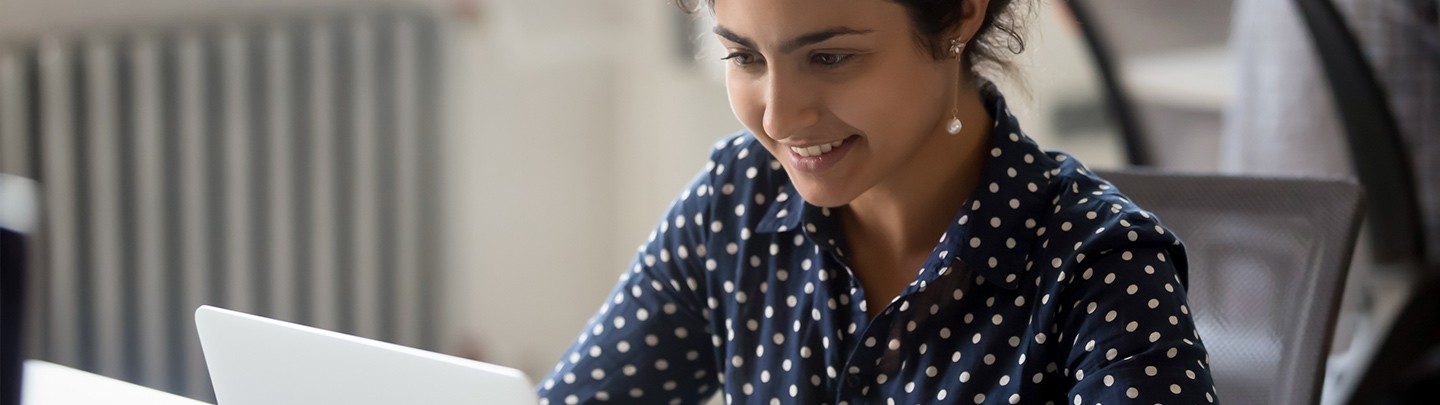 Woman sitting at her computer