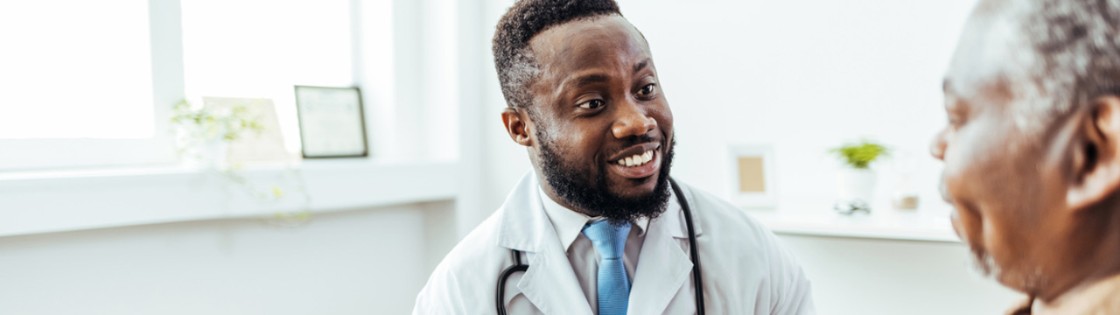 Physician speaking with patient